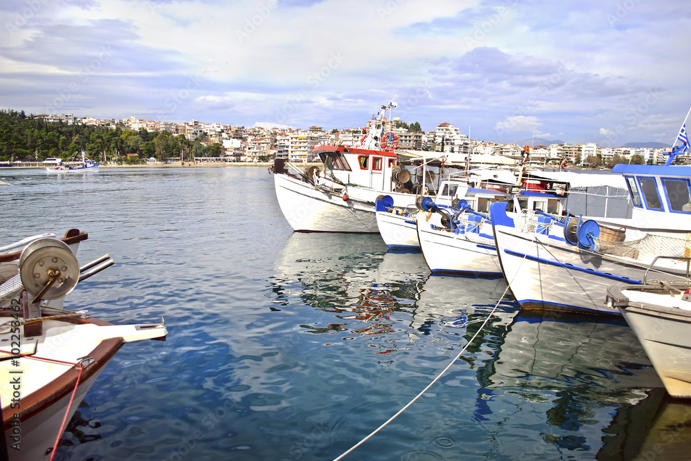 Obraz premium fishing boats at Chalcis Euboea Greece - crazy water phenomenon