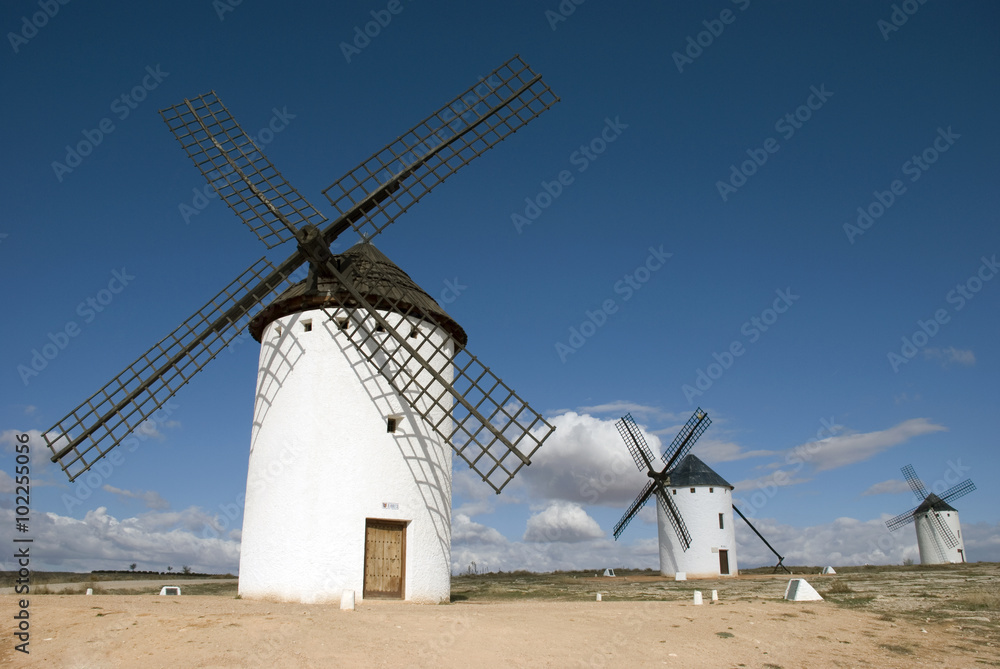Three windmills in the field in Spain