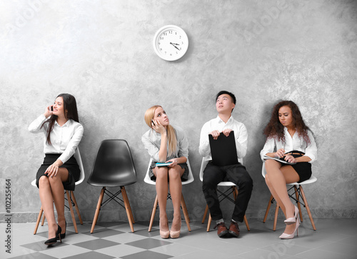 Young people sitting on a c...
