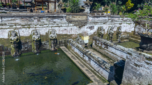 Pool at Goa Gajah ancient temple in Bali, Indonesia photo
