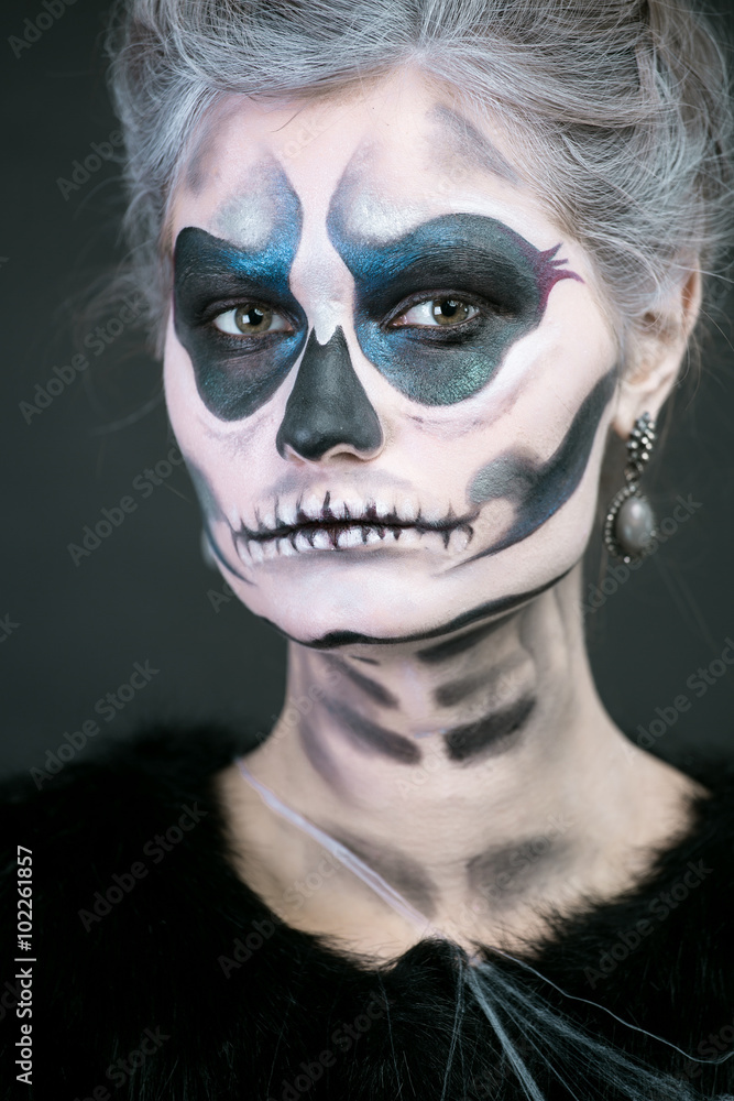 girl in the image of a skeleton on a black background girl in the image of a skeleton on a black background