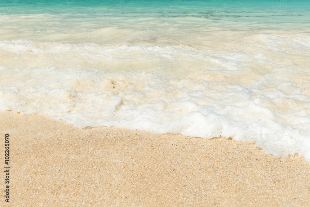Beautiful sand beach and tropical turquoise blue sea.