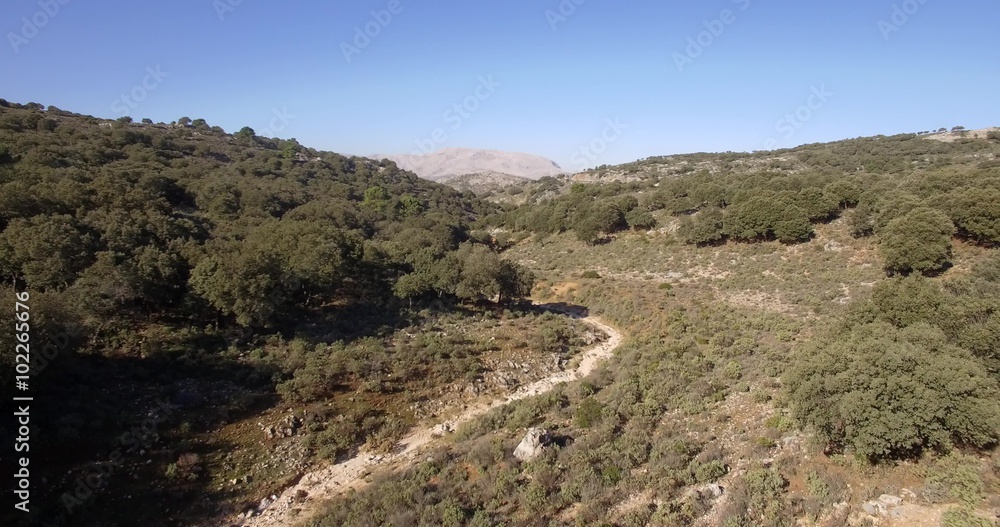 4K Aerial, flight along a riverbed, Andalusia, Spain - straight out of the camera, no recompression. 4K Aerial, flight along a riverbed, Andalusia, Spain - straight out of the camera, no recompression.