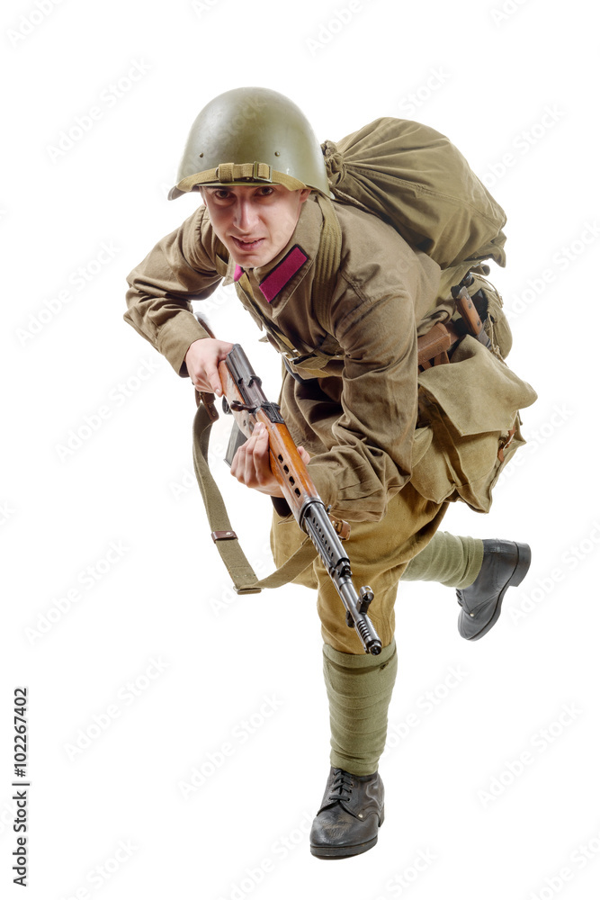 young Soviet soldier with rifle on the white background young Soviet soldier with rifle on the white background