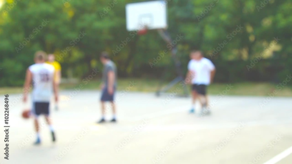 Defocused basketball players - slow motion. Defocused basketball players - slow motion.