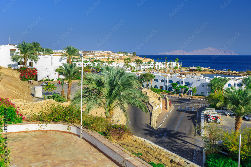 Panorama of white city at a tropical holiday resort, Egypt 
