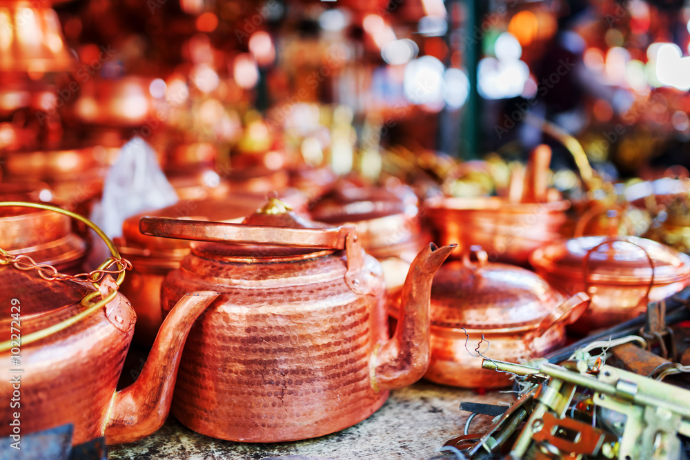 Vintage copper tea kettles at market in Lijiang, China