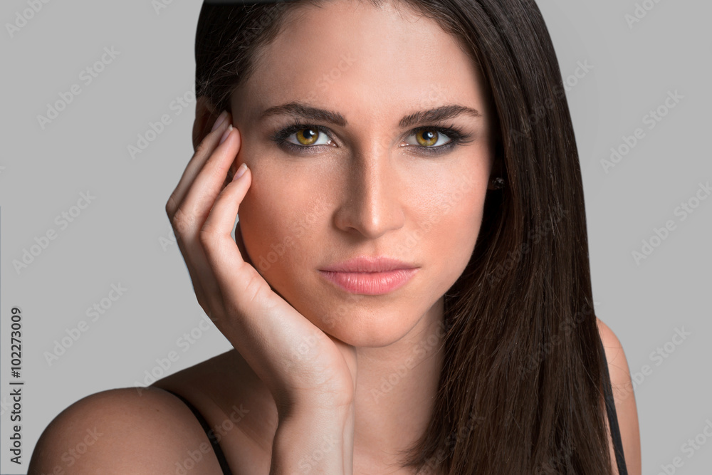 Fototapeta premium Beautiful headshot of brunette model gorgeous eyes determined stare confident elegant sophisticated woman in thought