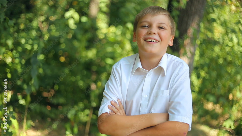 Caucasian Joyful child teenager boy laughing and smiling Caucasian Joyful child teenager boy laughing and smiling