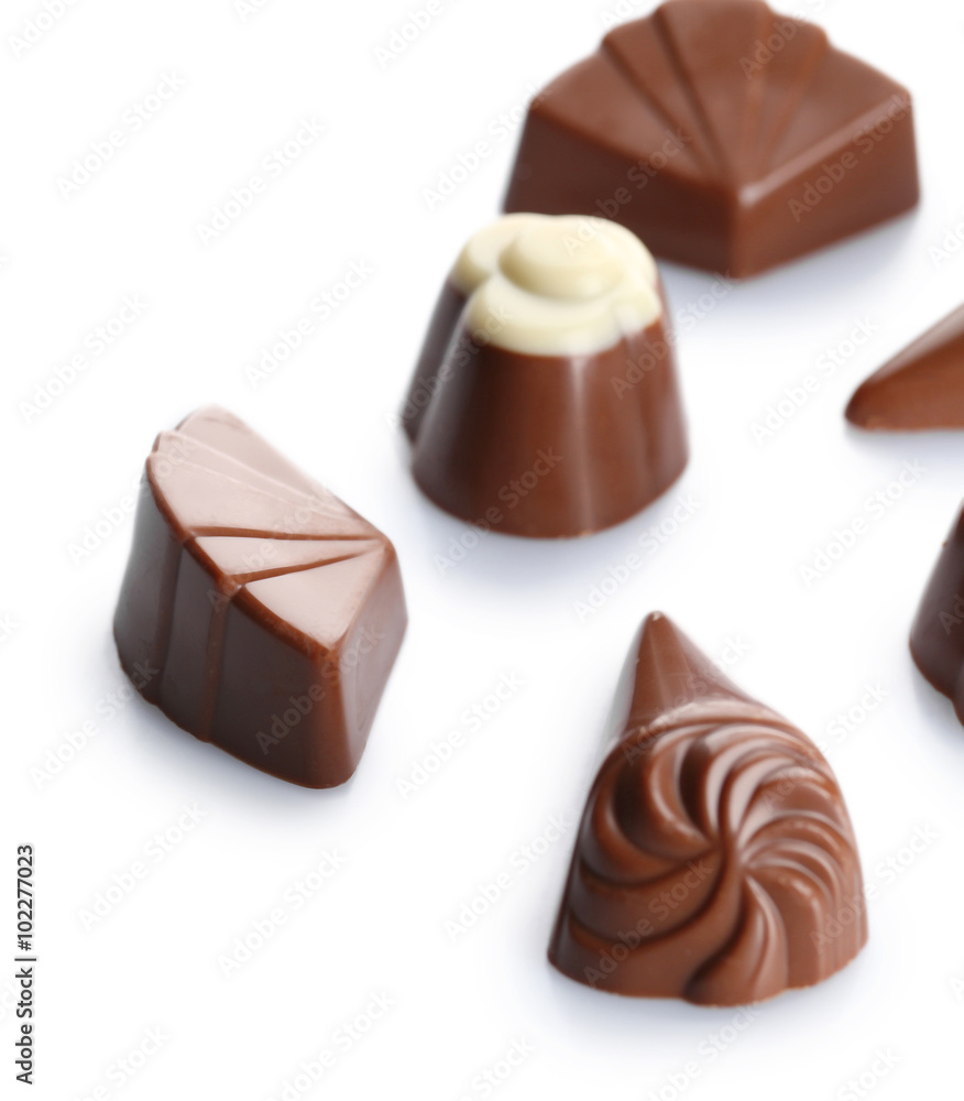 Assorted chocolate candies, isolated on white Assorted chocolate candies, isolated on white