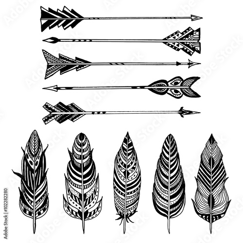 Set of Arrows and feathers on white background. Set of Ornamental Boho Style elements. Vector illustration. 