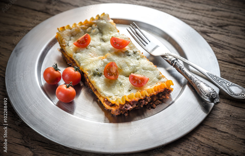 Lasagna on the metal plate Lasagna on the metal plate