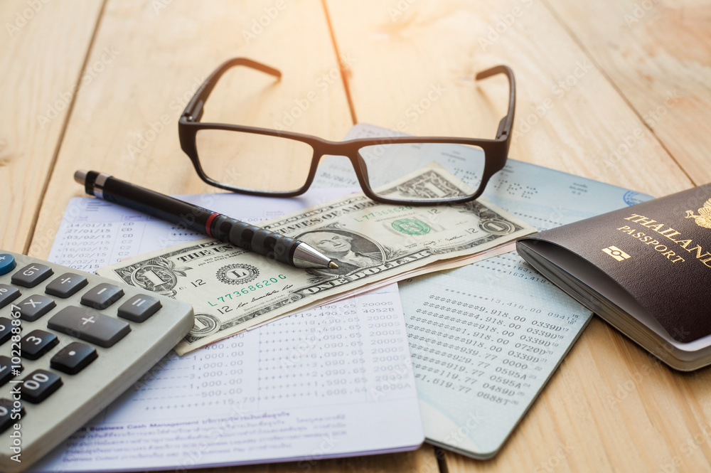 Bank account Pen,dollar,glasses ,coffee cup and calculator with Bank account Pen,dollar,glasses ,coffee cup and calculator with
