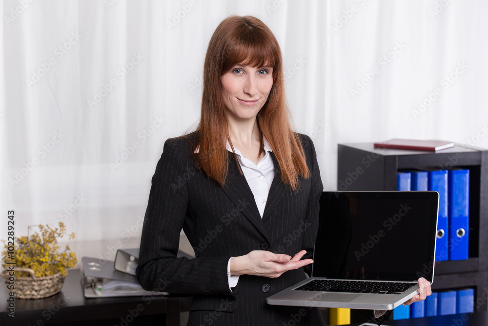 Business woman show the notebook Business woman show the notebook