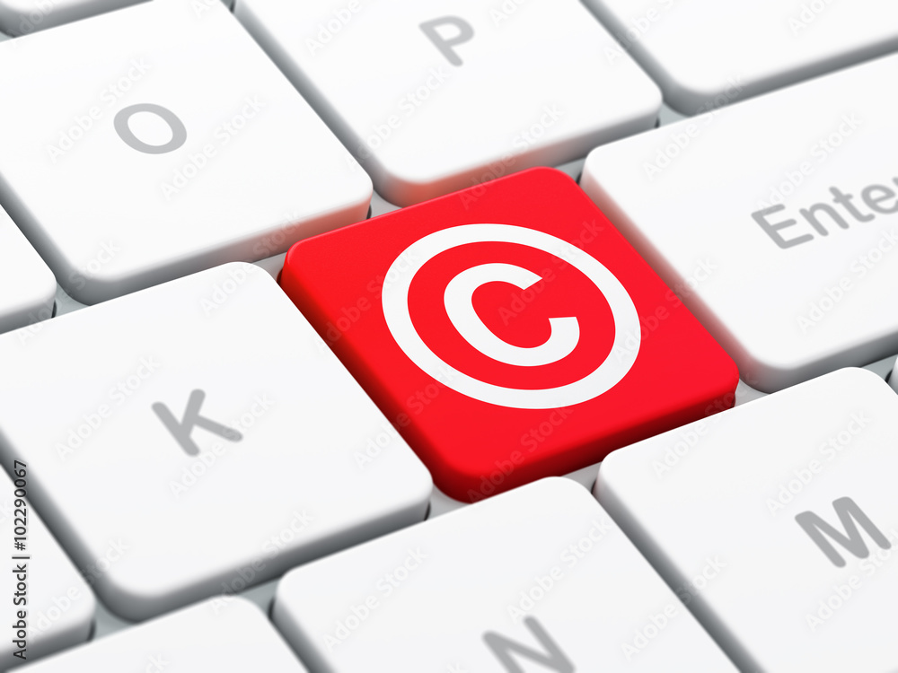 Law concept: Copyright on computer keyboard background