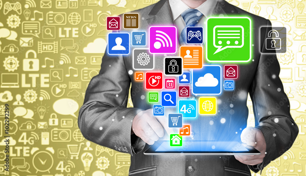 Business man using tablet PC with social media icon set Business man using tablet PC with social media icon set