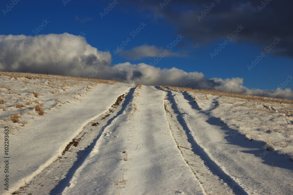 Winter Landscape with White Clouds Blue Sky