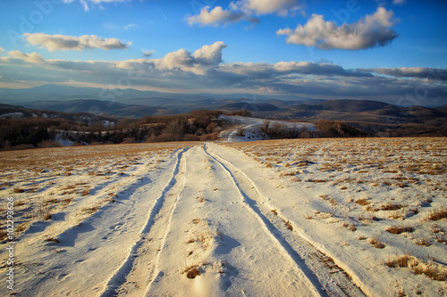 Winter Landscape with White Clouds Blue Sky