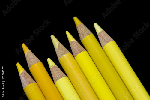 7 Yellow Pencils - Black Background