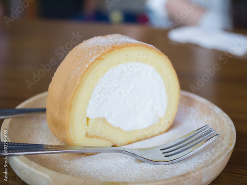 Milk roll cake on a plate