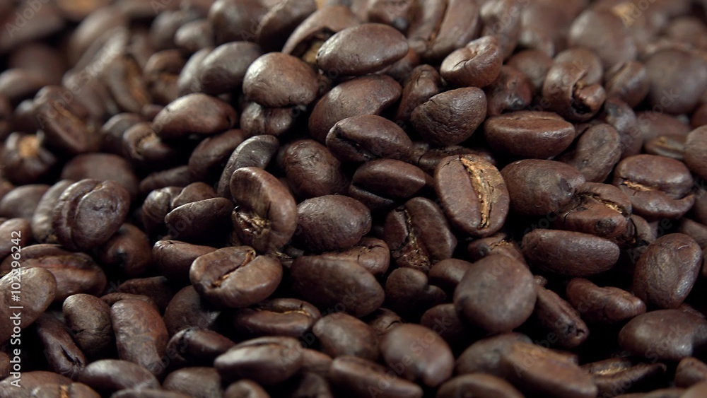 Portion of rotating Coffe Beans (not seamless loopable 4K UHD footage) Portion of rotating Coffe Beans (not seamless loopable 4K UHD footage)