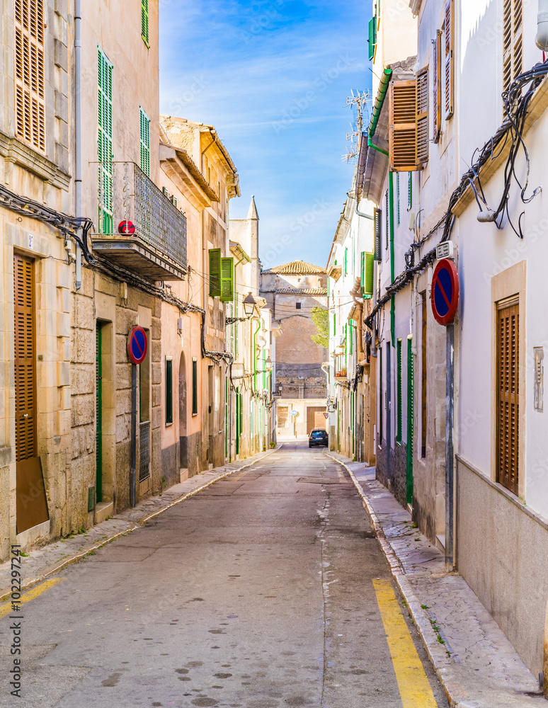 Mediterranean street with rustic old buildings