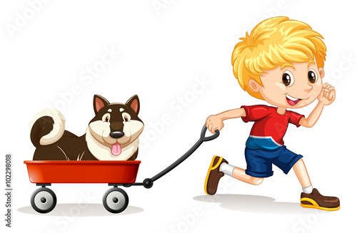 Boy pulling cart with dog on it