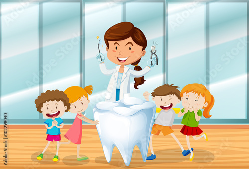 Dentist and happy children