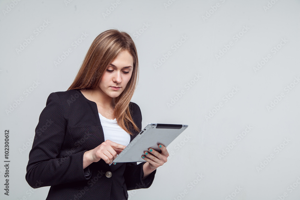 Smiling Businesswoman Holding Digital Tablet. Isolated On White Smiling Businesswoman Holding Digital Tablet. Isolated On White