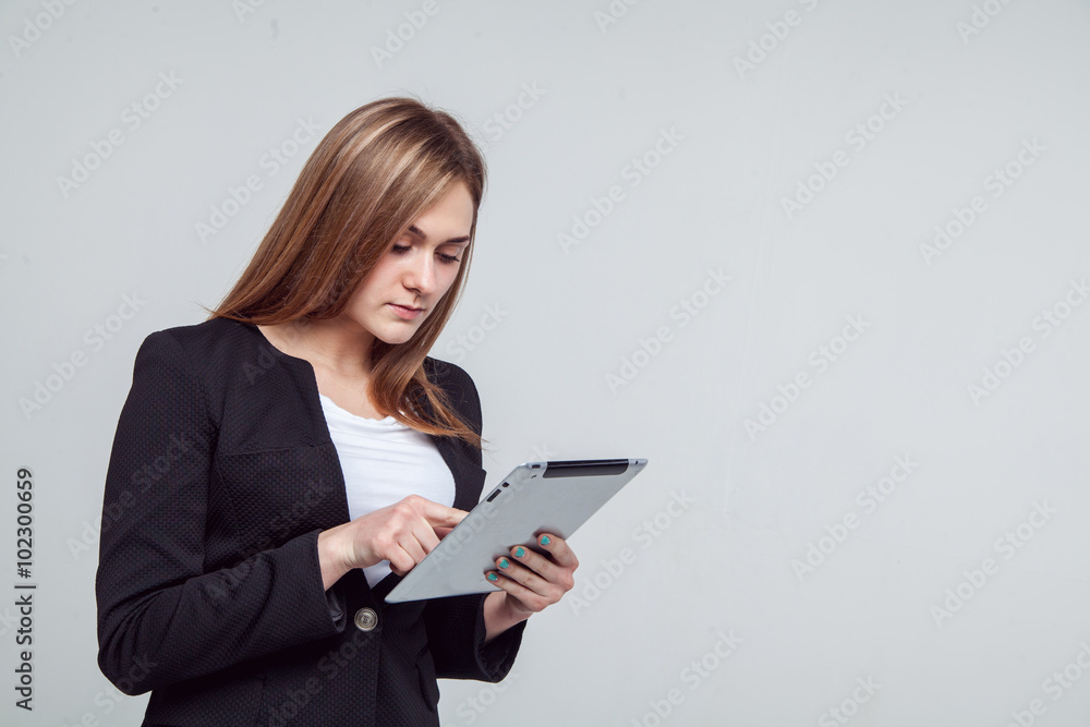 Smiling Businesswoman Holding Digital Tablet. Isolated On White Smiling Businesswoman Holding Digital Tablet. Isolated On White