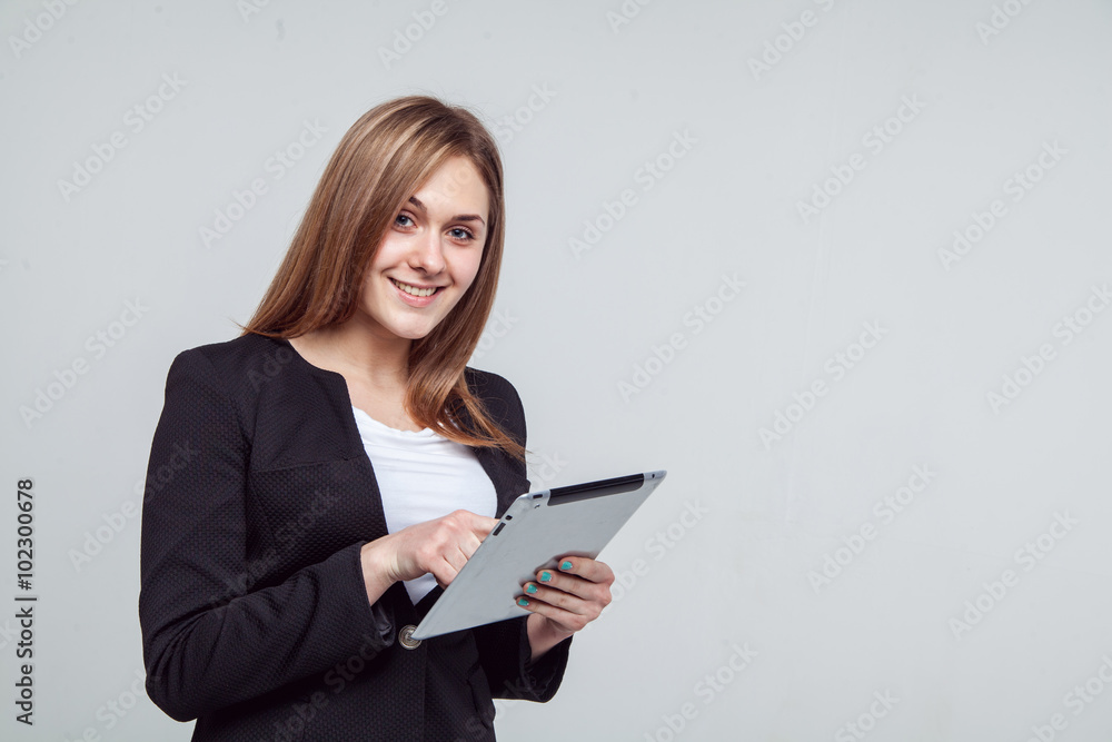 Smiling Businesswoman Holding Digital Tablet. Isolated On White Smiling Businesswoman Holding Digital Tablet. Isolated On White