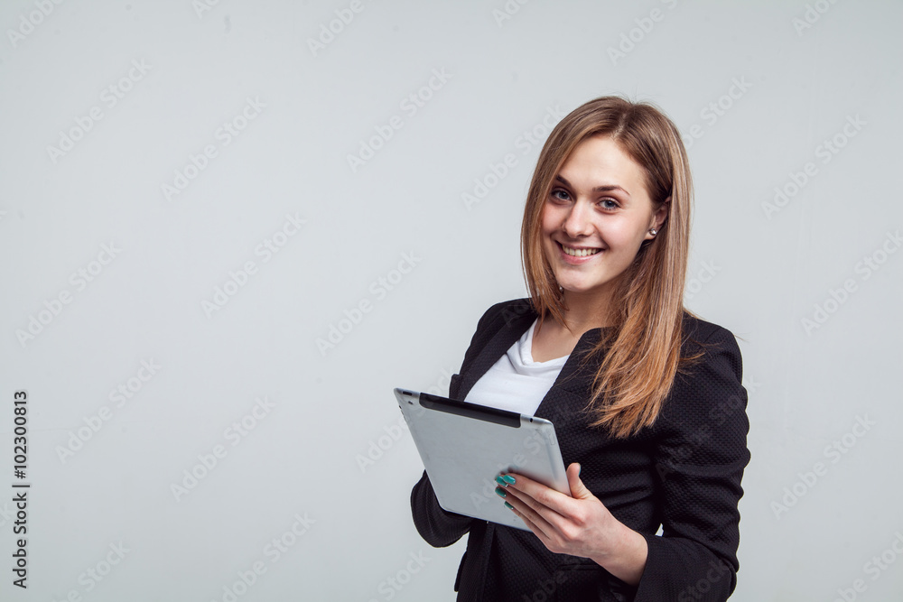Smiling Businesswoman Holding Digital Tablet. Isolated On White Smiling Businesswoman Holding Digital Tablet. Isolated On White