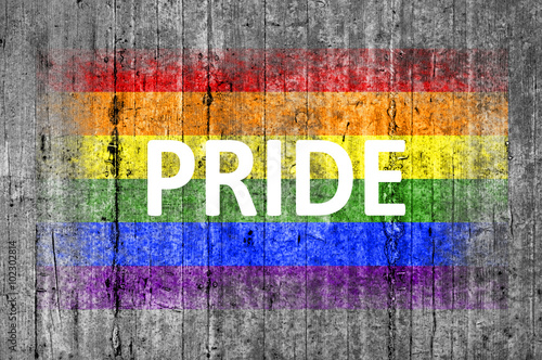 Pride and LGBT flag painted on background texture gray concrete