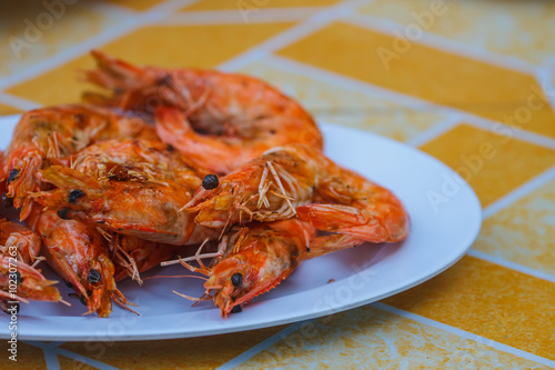 Grilled prawns on plate