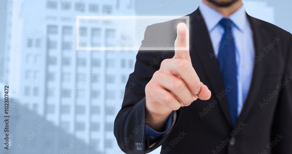 Composite image of businessman pointing his finger at camera Composite image of businessman pointing his finger at camera