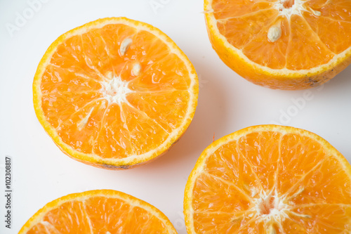 Oranges fruit, half of orange, orange isolated and basket with a lot of oranges