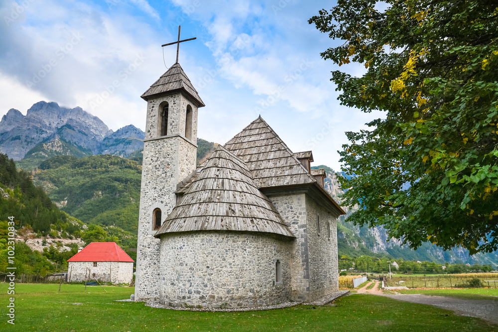 Ancient stone church in a mountain village Ancient stone church in a mountain village