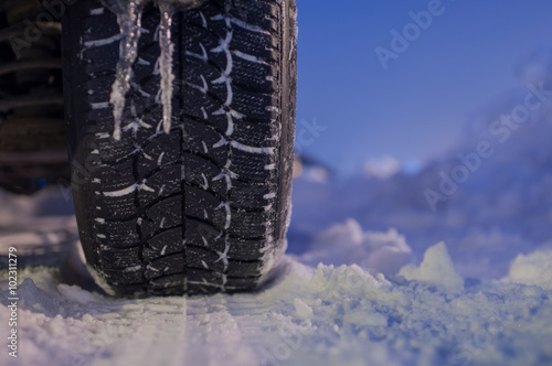 Winter tyre on the road with snow © mastermilmar