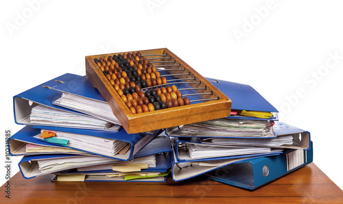 Wallpaper Mural Old wooden abacus on pile of an office folders Torontodigital.ca