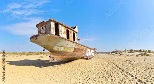 Panorama. Old ship in the Aral desert, rear view