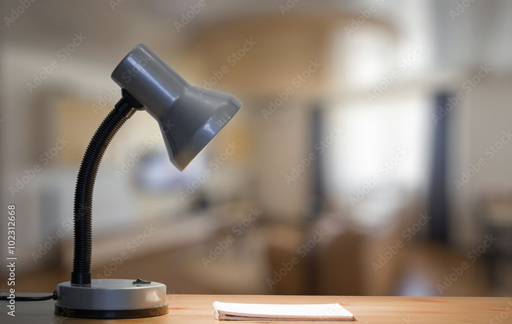 lamp and notebook on table lamp and notebook on table