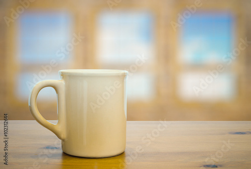 mug on old wooden table