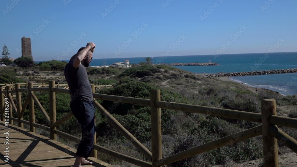 Man jump near the barrier terrace, super slow motion
Man jump near the barrier terrace, super slow motion