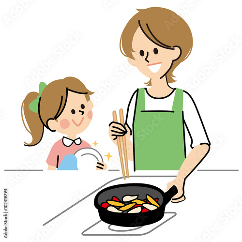 料理をする母と子ども