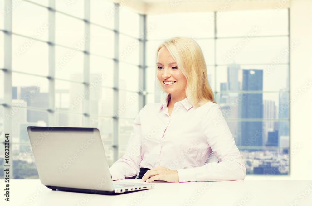 smiling businesswoman or student with laptop smiling businesswoman or student with laptop