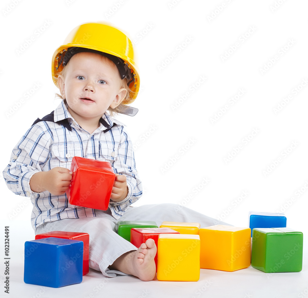 little engineer plays with cubes