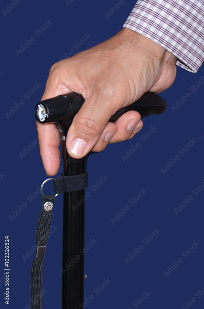 Fototapeta premium Mano con bastón