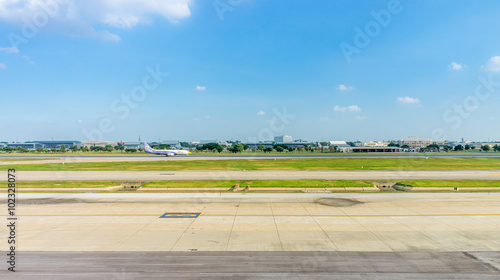 Scenery view of an airport. It consists of runway, taxiway and apron.