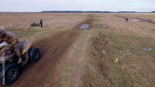 Aerial view of atv jimp. Slowmotion. photo