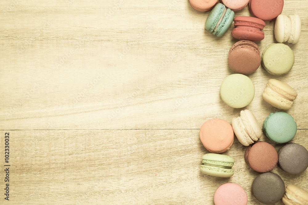 colorful macaroons on wooden background , top view
colorful macaroons on wooden background , top view